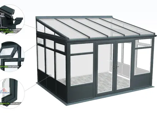 A modern conservatory with a grey aluminium structure and a dark grey muret soubassement. The roof is made of translucent panels.