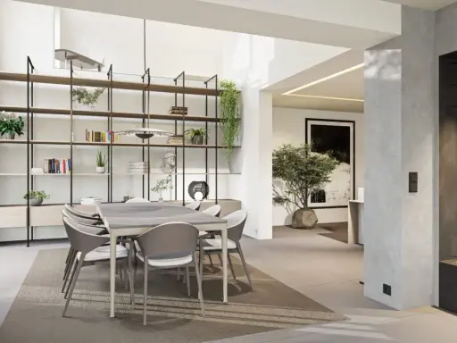 Une salle à manger moderne et lumineuse, avec une grande étagère murale, une table et des chaises, et une cheminée design. Cette **petite extension de maison** est un espace de vie accueillant.