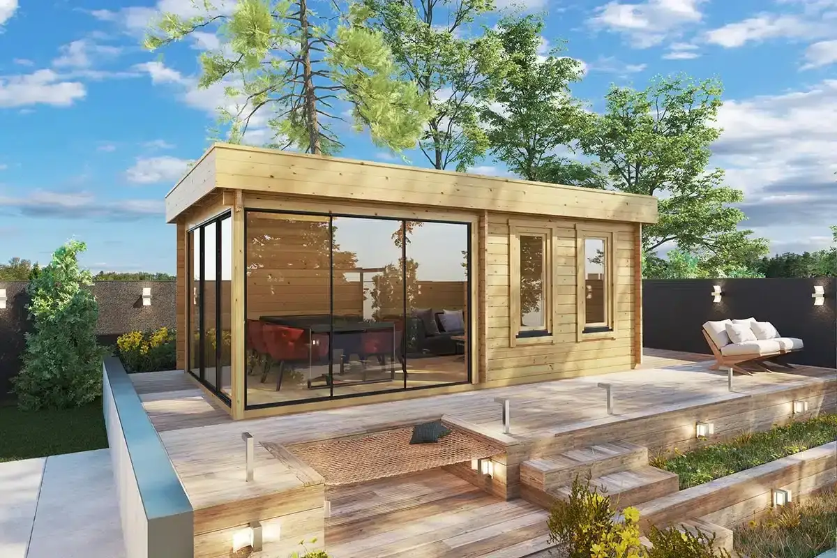 Une v&eacute;randa sur terrasse sans fondation, en bois, avec de grandes baies vitr&eacute;es et un mobilier d'ext&eacute;rieur invitant.